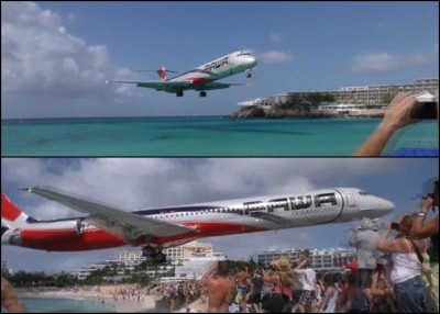 一架客机极低空飞过沙滩。