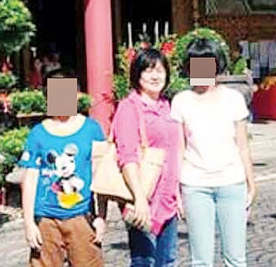 死者(中)新年前与一对儿女前往吉隆坡观光。