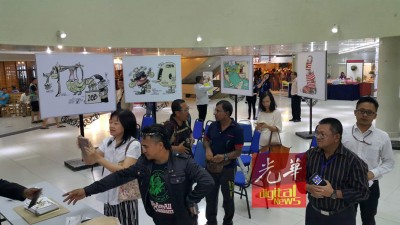“斗争通过卡通”漫画展周五(25日)在光大3楼举行。
