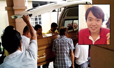 殡葬业者把死者遗体送往邱公司殡仪馆设灵。