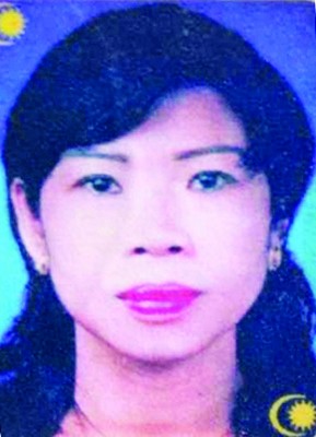 死者蔡丽华(译音)遗容。