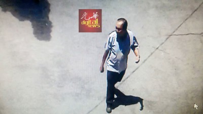 行迹可疑中年男子。