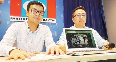 李健聪(左起)跟郑立慷公开窃贼偷窃的闭路电视画面。