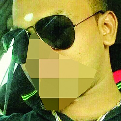 起在视频中和怀疑喂食男童服毒的印裔男子。