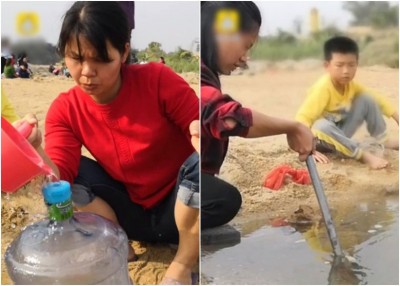 有人装走温泉水,啊有人即会煮温泉蛋。