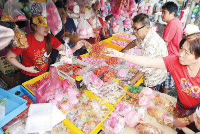 抢购拜天公供品,槟城福建人准备“过年”了。