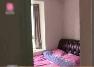 刘男用针孔摄像镜头安装在女职员卧室。
