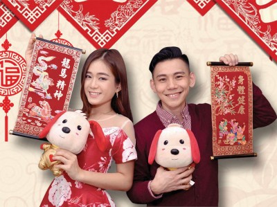 李吉汉同梁祖仪祝愿《光明日报》读者:龙马精神,人健康过个旺旺年!