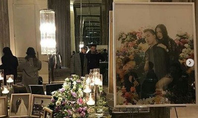 太阳与闵孝琳选用先前拍的黑色礼服当婚纱照。