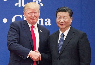 特朗普盛赞习近平(右)是个伟大的人,还称自己到访中国时受到礼遇。