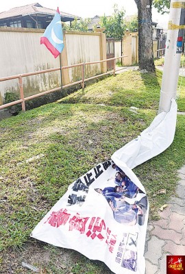 大选一切都决定,只是等待政党竞选海报及旗帜被拆。