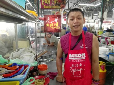 黄志强:“当小贩10年,还没雇佣外劳。”