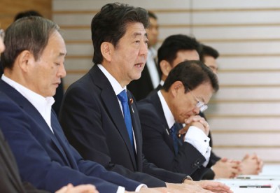 安倍晋三指示各部全力救灾。(法新社照片)