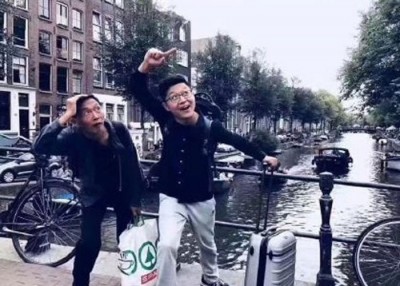 曾先生负荷兰游的肖像,凡以事发前10多上拍摄的。