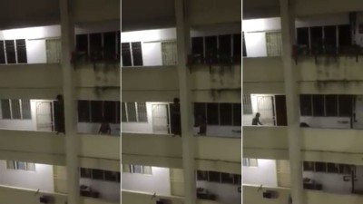 62岁华裔男子不堪病魔折腾,企图坠楼自尽,所幸邻居见义勇为,抓紧机会及一把抓住该男子的双腿,救了一条性命。