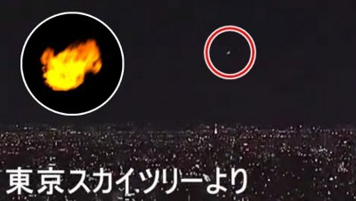 东京晴空塔顶的镜头也拍得火球(红圈)。有大阪网民用望远镜拍下的火球(圈图)。