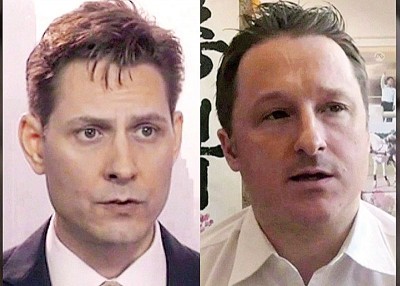 康明凯（左）及斯派佛（右）仍然被扣留。