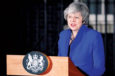 特丽莎梅暂时保住首相之位。（法新社照片）