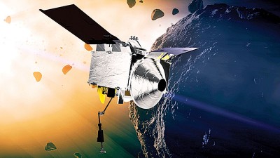 NASA发布欧西里斯号在贝努小行星旁的模拟图。