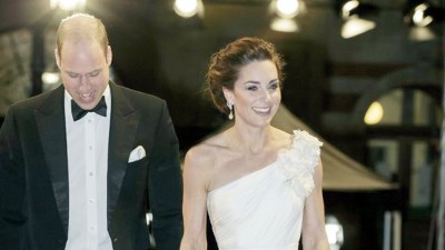 英国威廉王子与凯特王妃出席英国影艺学院电影奖，凯特穿白色礼服被盛赞气质出众。