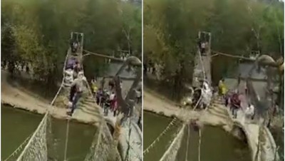 游客在铁索桥上制造“波浪”，结果令铁索桥断裂。