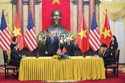 美越两国签署总值210亿美元(粗粗854亿令吉)的市协议。(法新社照片)