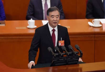 全国政协主席汪洋在中国人民政治协商会议第13届全国委员会第2次会议开幕式中发表工作报告。（法新社照片）