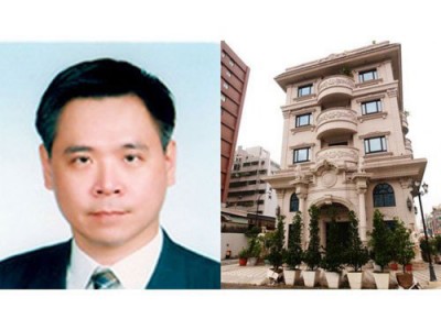 郭国圣,图右为他的豪宅。