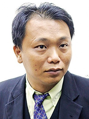 谭文杰。